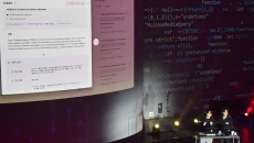 PhnyX representatives demonstrating the genAI chatbot Cheiron