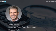 Aytan Dahukey at Sheppard Mullin_Magnifying glass, calculator and charts Photo by deepblue4you/iStock/Getty Images Plus