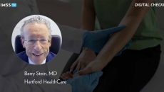 Barry Stein at Hartford HealthCare_Doctor taking pulse of patient Photo by bymuratdeniz/E+/Getty Images