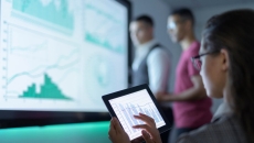 Researchers analysing graphs