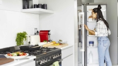 Person looking in a refrigerator