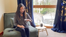 A patient at home using a pulse oximeter