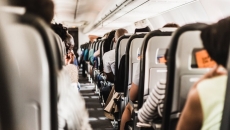 A view of an aisle in an airplane