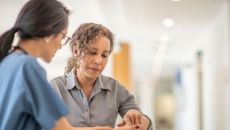 A person talking to her doctor.