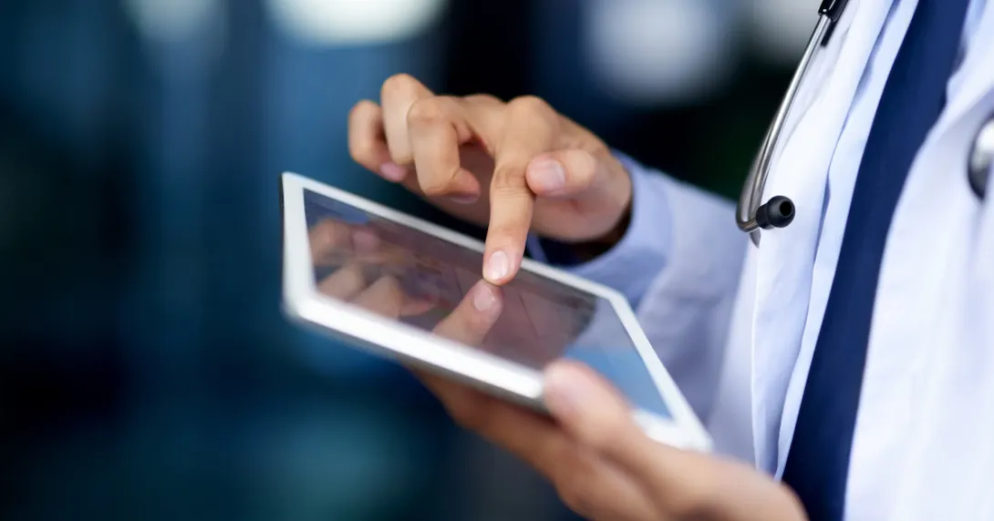 Healthcare provider on a tablet