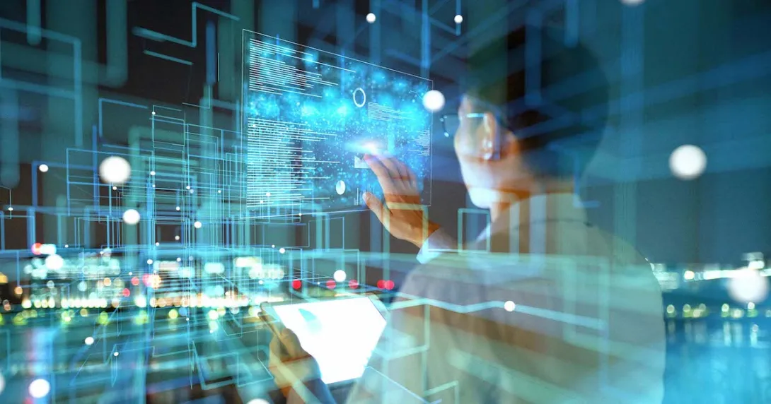 Person looking at digital images on a wall