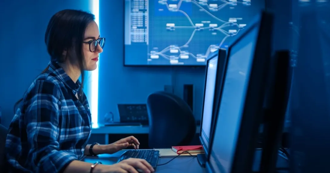 Person sitting at computer monitor