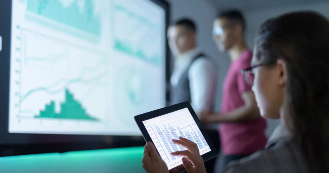 Researchers analysing graphs