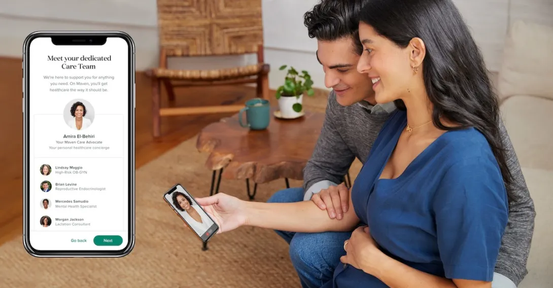 A pregnant women and her partner talking to a Maven provider.