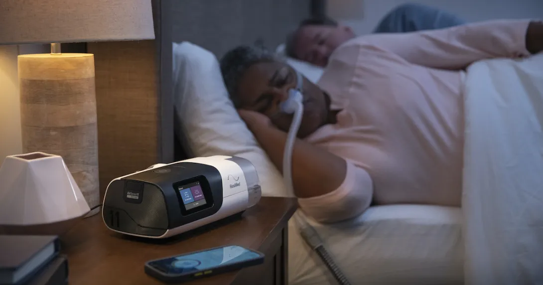 Person sleeping using the ResMed AirSense 11
