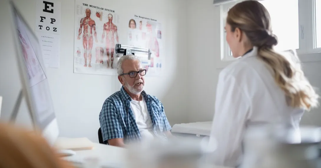 Healthcare professional consulting with patient